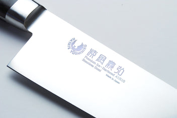 Santoku chef’s knife blade engraving on stainless steel with dark metal bolster