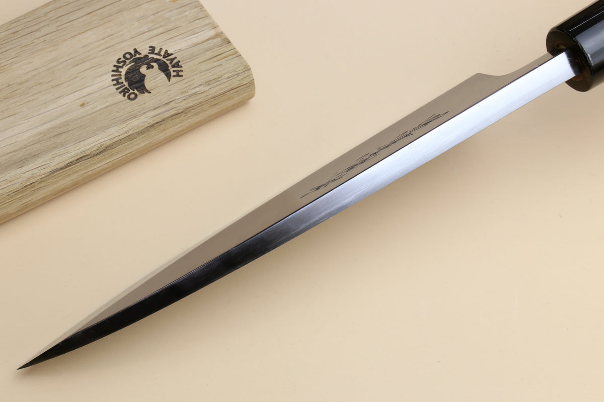 Long deba fish fillet knife with pointed white blade and light magnolia handle, black collar
