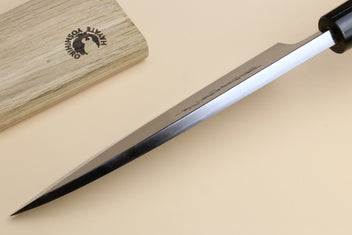 Long deba fish fillet knife with pointed white blade and light magnolia handle, black collar
