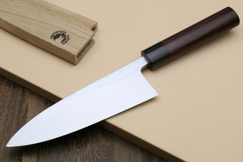Deba fish fillet knife with white steel blade and dark rosewood handle, tip down