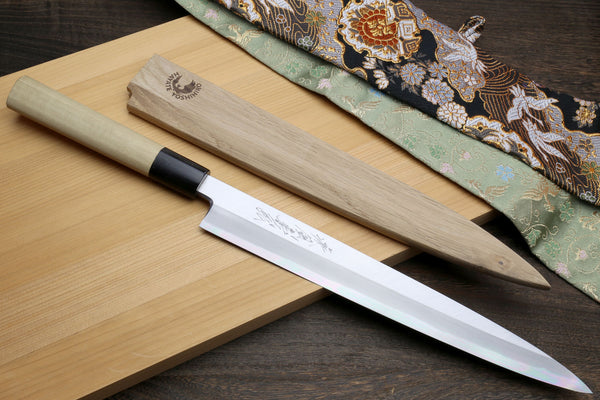 Two yanagi sashimi knives with white steel blades and black magnolia handles