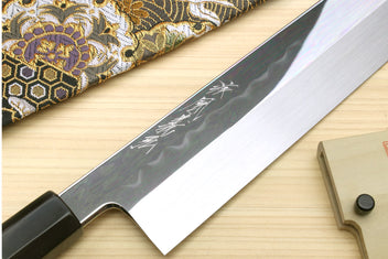Japanese vegetable knife blade with etched pattern, dark handle with silver ring