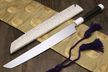Japanese sushi sashimi knife with speckled white saya, exposed blade, and purple tassel cord