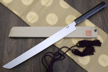 Sakimaru sushi knife with white steel blade and ebony handle, shown laid out