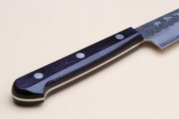 Petty utility knife with dark wooden handle, three rivets, and silver blade
