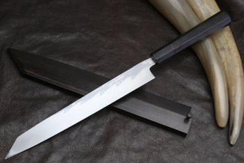 Japanese yanagi sushi knife with ivory horn handle accents and black saya