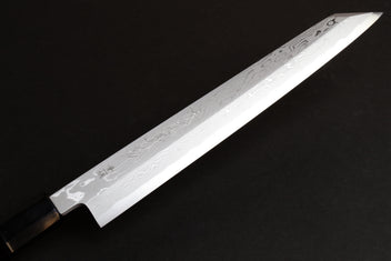 Japanese yanagi sushi knife, damascus-pattern blade with ebony handle