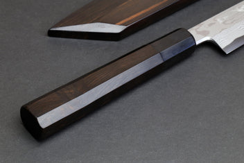 Japanese yanagi sushi knife with dark wood handle and damascus steel blade