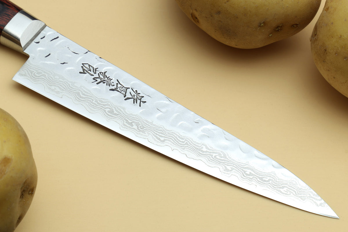 Damascus stainless knife blade with hammered pattern and etched characters