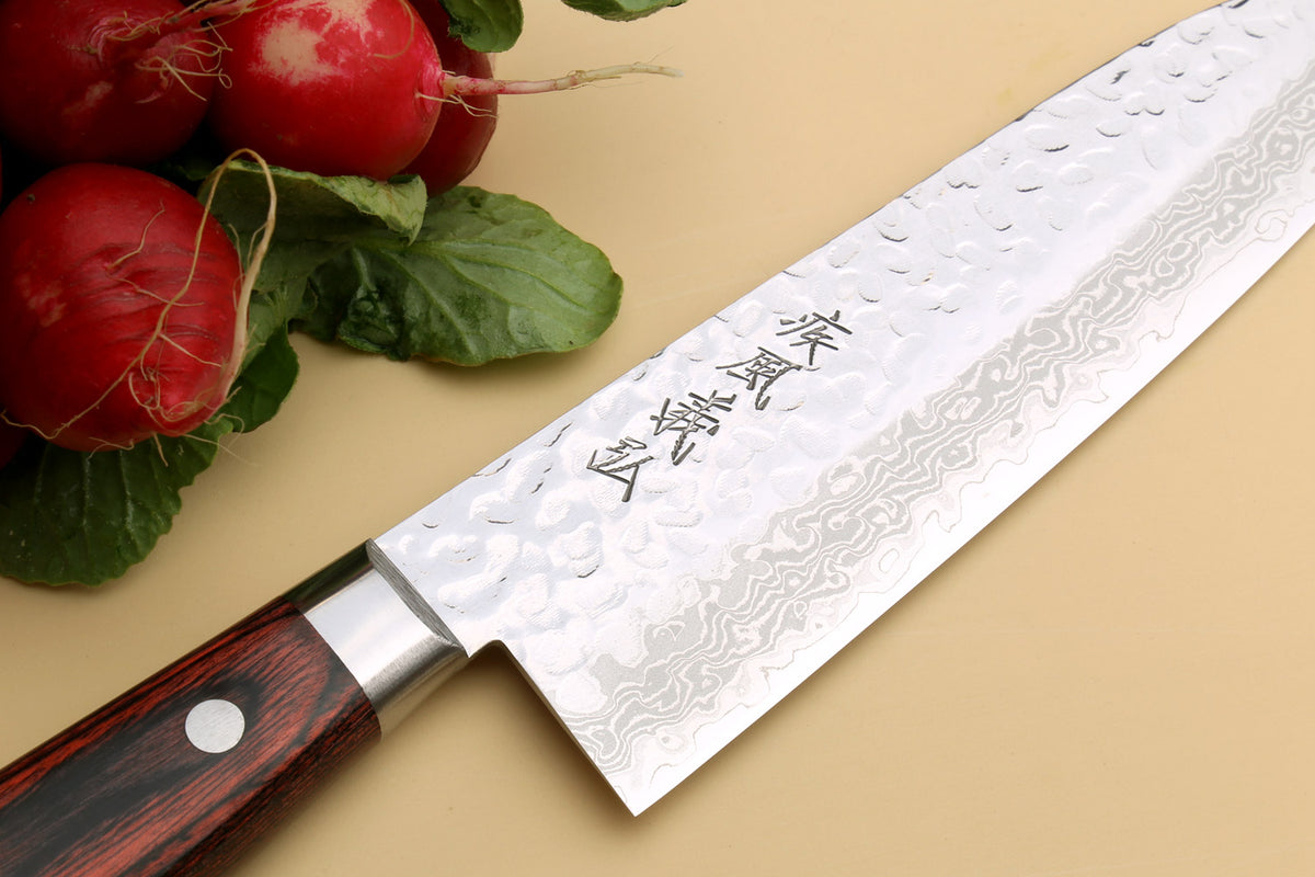 Damascus santoku knife blade with etched pattern and dark wood handle