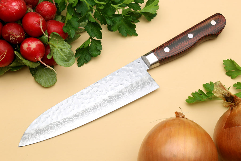 Backside of hammered textured knife