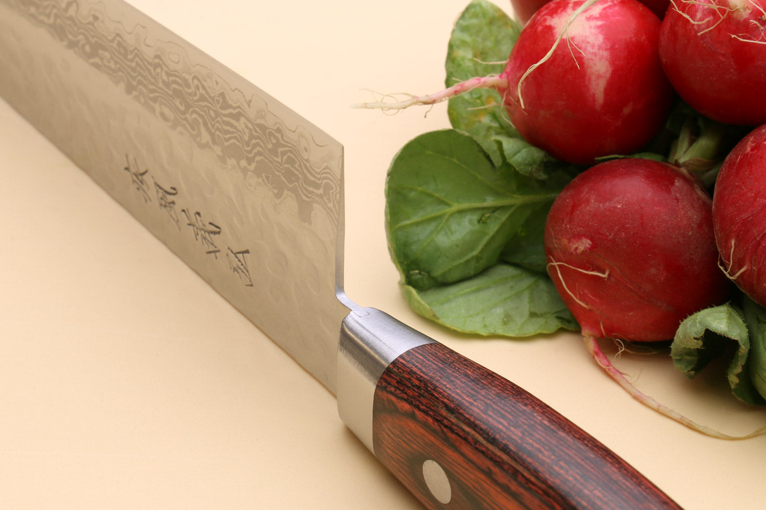 Knife heel next to red raddishes
