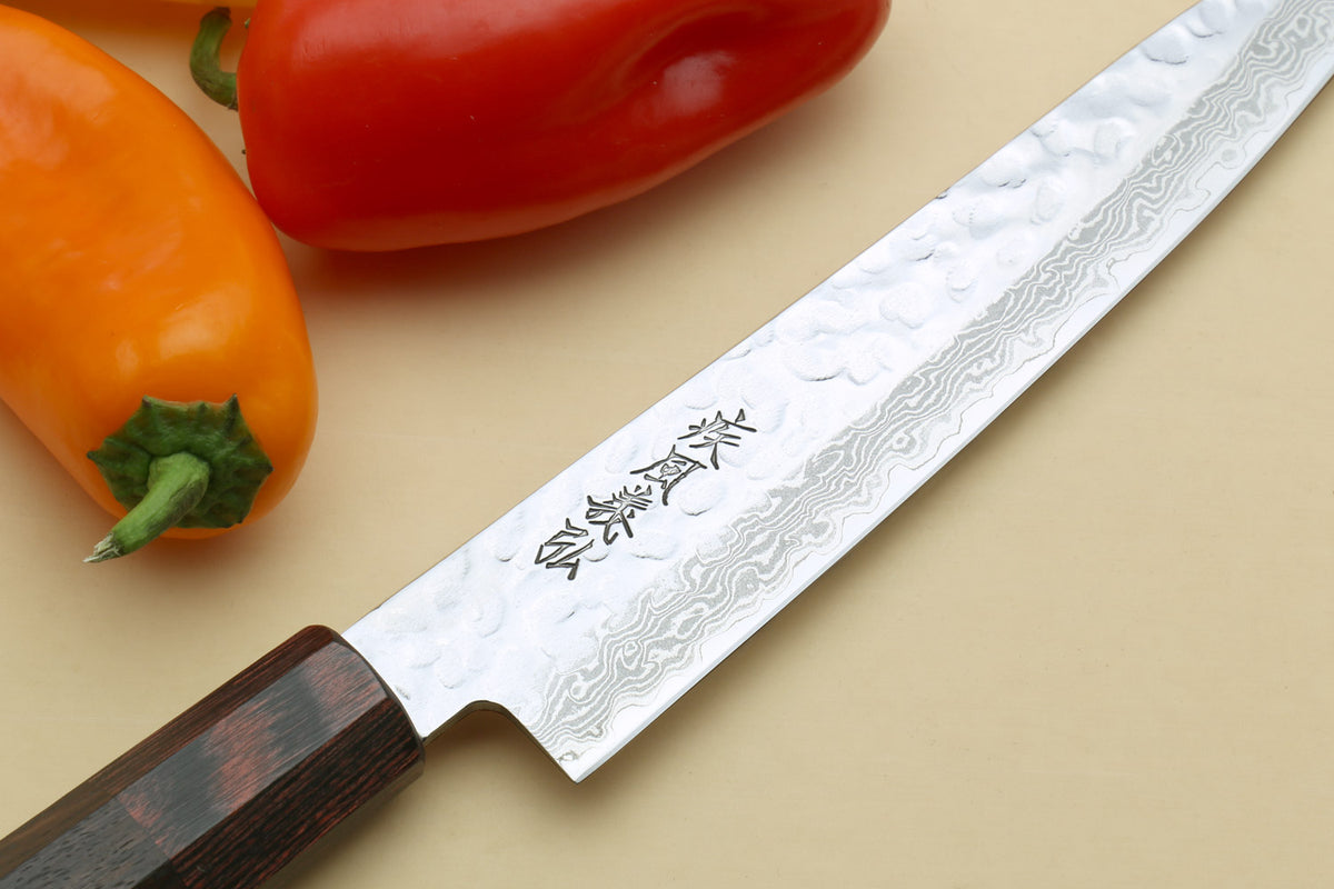 Damascus petty knife with etched blade pattern and rosewood handle